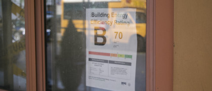 Sign in window of building for energy efficiency rating Grade B