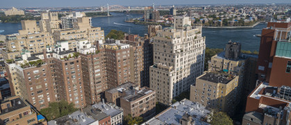 Aerial panoramic scenic view over Upper East Side Manhattan and East River toward Astoria, Queens, New York, USA
