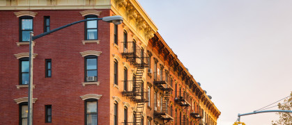 Brooklyn brownstone apartment buildings at sunset