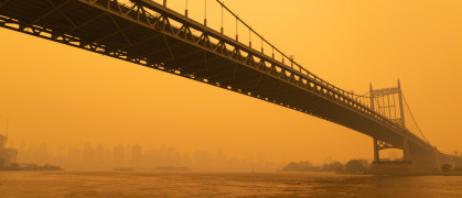 Smoke from wildfires obscures the Triborough Bridge.