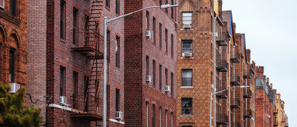 A row of Brooklyn apartment buildings.