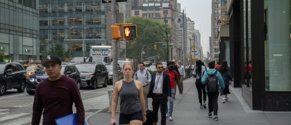 New Yorkers crossing the street with a red light in Manhattan