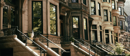 Row of brownstones in Park Slope Brooklyn on an autumn morning. NYC.