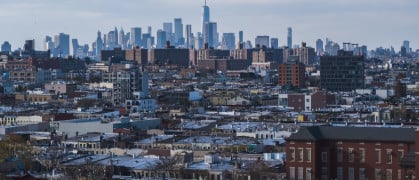 Residential district in Bushwick, Brooklyn, New York, with the distant view on Freedom Tower in Lower Manhattan.