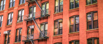 A brick new york city apartment facade.