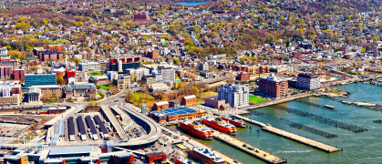 Aerial view of Staten Island St George Ferry terminal. Manhattan Area, New York of USA. Skyline and cityscape with skyscrapers at United States of America, NYC, US. American architecture.