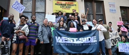Tenants of 438 and 440 West 45th Street spoke in support of two bills that would give tenants, nonprofits, and community land trusts first crack at buying their apartment buildings. Tenants of 438 and 440 West 45th Street gathered on the stoop of the apartment building at 438.