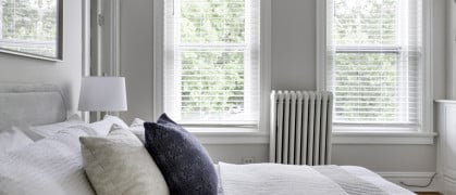 Bedroom with cast iron radiator