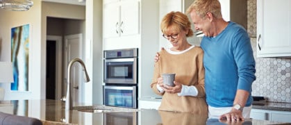 empty nesters in modern kitchen