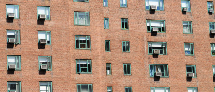 Manhattan apartment building exterior with AC units