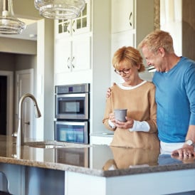 empty nesters in modern kitchen