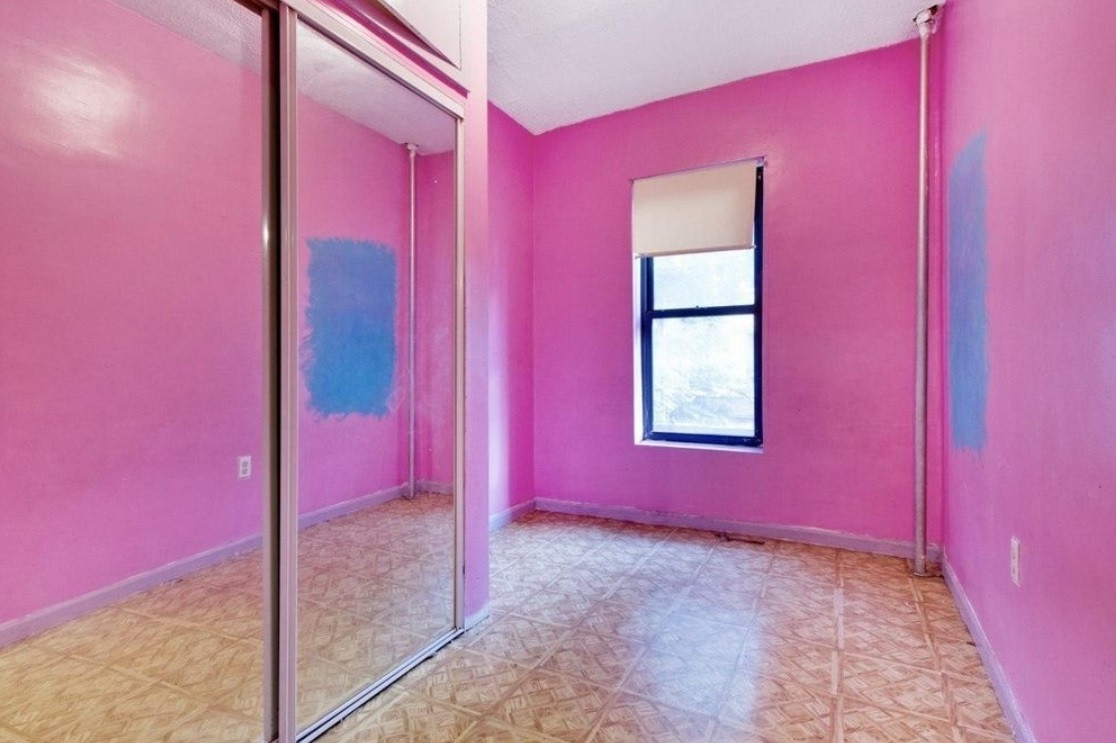 A lot of TLC needed to transform this outdated Sunset Park two bedroom