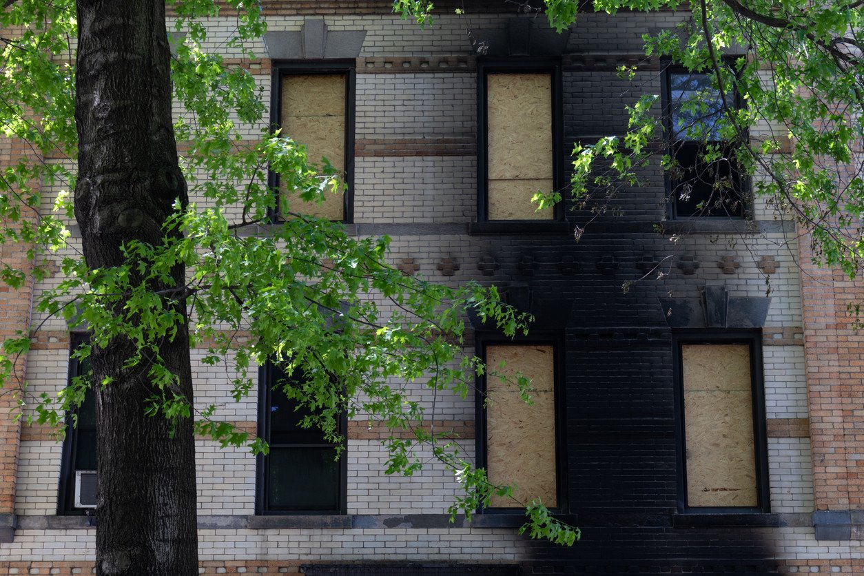 Burned and Boarded Up Windows