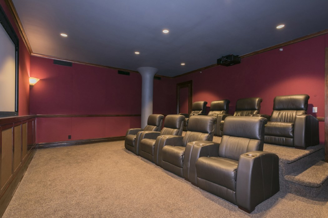 Image showcasing Six homes with plush private screening rooms for catching this Sunday's ...