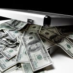 iStock-suitcase full of money.jpg image